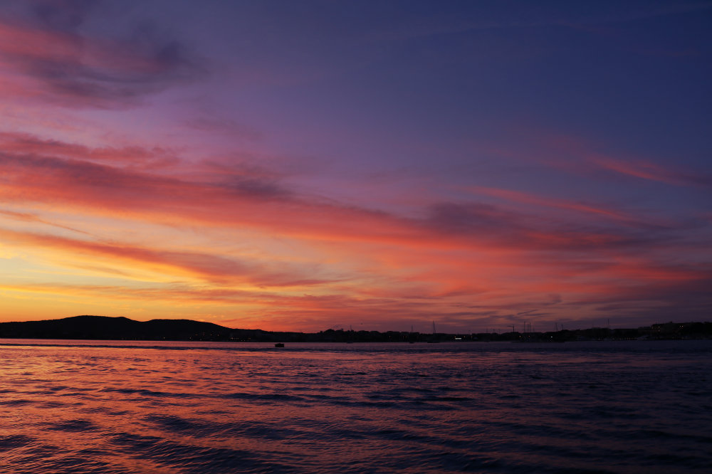 Il tramonto al rientro in porto a Golfo Aranci